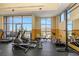Bright, spacious gym offering a range of cardio and strength training equipment with large windows and city views at 1108 N Franklin St # 602, Tampa, FL 33602