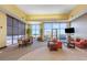 Inviting living room with large windows, comfortable seating, and an open layout for relaxation and socializing at 1108 N Franklin St # 602, Tampa, FL 33602