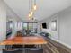 Stylish living area showcasing a modern design and comfortable seating area with kitchen view at 1108 N Franklin St # 602, Tampa, FL 33602