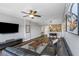 Open-concept living room flowing into the kitchen, with modern decor and hardwood floors at 1108 N Franklin St # 602, Tampa, FL 33602