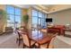 Bright living room with large windows and comfortable seating, perfect for relaxing or entertaining guests at 1108 N Franklin St # 602, Tampa, FL 33602