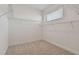 Walk-in closet with carpet flooring and wire shelves at 11311 Striped Bass Ct, New Port Richey, FL 34654