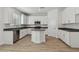 Stylish kitchen with stainless appliances, modern light fixtures, and sleek countertops at 11311 Striped Bass Ct, New Port Richey, FL 34654