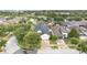 A charming home with a dark roof, nestled in a lush, green, and quiet neighborhood at 12721 Avelar Creek Dr, Riverview, FL 33578