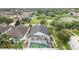 A beautiful aerial view of the property, highlighting the pool, backyard and neighborhood at 12721 Avelar Creek Dr, Riverview, FL 33578