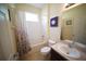 Bathroom with a shower and tub combination, a light fixture, a framed mirror, and a vanity with a sink at 12721 Avelar Creek Dr, Riverview, FL 33578