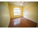 Bedroom with a large window and neutral walls, creating a serene atmosphere at 12721 Avelar Creek Dr, Riverview, FL 33578