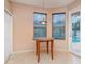 Cozy breakfast nook with a table and natural light, overlooking the pool area at 12721 Avelar Creek Dr, Riverview, FL 33578