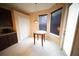 Cozy breakfast nook with a table and natural light at 12721 Avelar Creek Dr, Riverview, FL 33578