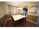 Dining space offering natural light and views of the kitchen at 12721 Avelar Creek Dr, Riverview, FL 33578