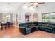 Open-concept living area with a view of the dining space and kitchen, perfect for entertaining at 12721 Avelar Creek Dr, Riverview, FL 33578