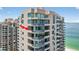 Relaxing balcony with a view of the beach and ocean in this luxury condo at 1540 Gulf Blvd # 2107, Clearwater Beach, FL 33767