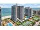 Beachfront condo community featuring pools, tennis courts and lush landscaping at 1540 Gulf Blvd # 2107, Clearwater Beach, FL 33767