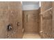 Modern walk-in shower features neutral tile, a built-in bench, and multiple shower heads at 16304 Wild Mallard Dr, Odessa, FL 33556