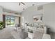 Bright living room with vaulted ceilings, neutral colors, and sliding door access to backyard at 1741 Elk Spring Dr, Brandon, FL 33511