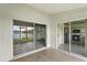 This home boasts a screened patio with tranquil water views and easy access to the kitchen through sliding glass doors at 1741 Elk Spring Dr, Brandon, FL 33511