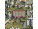 Aerial view of a community's four well-maintained tennis courts at 2328 Harn Blvd, Clearwater, FL 33764