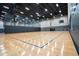 Indoor basketball court with wood flooring, high ceilings, and ample lighting at 2328 Harn Blvd, Clearwater, FL 33764