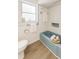 Bathroom with a blue bathtub at 2328 Harn Blvd, Clearwater, FL 33764