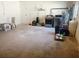 Spacious garage featuring laundry hookups, ample storage space and a chair and end table at 2328 Harn Blvd, Clearwater, FL 33764