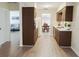 A modern kitchen showcasing stainless steel appliances and an open concept layout leading to a dining area at 2328 Harn Blvd, Clearwater, FL 33764