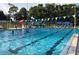 Community lap pool with several lanes, perfect for exercise or relaxing on a hot day at 2328 Harn Blvd, Clearwater, FL 33764
