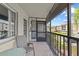 Unit balcony with seating and view at 2420 Winding Creek Blvd # 209, Clearwater, FL 33761