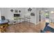 Living room with tv and bar seating at 2420 Winding Creek Blvd # 209, Clearwater, FL 33761