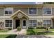 Charming two-story townhome with well-kept landscaping, sidewalk, and inviting front entrance at 2898 Thaxton Dr # 76, Palm Harbor, FL 34684