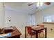 Flex room with ceiling fan with space for dining or office at 2898 Thaxton Dr # 76, Palm Harbor, FL 34684