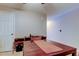 Versatile room with table offers flexible usage for office, dining, or recreation at 2898 Thaxton Dr # 76, Palm Harbor, FL 34684