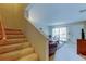 Upstairs hallway provides stair access to the main level living room at 2898 Thaxton Dr # 76, Palm Harbor, FL 34684