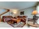 Comfortable living room with leather furniture and a warm, inviting atmosphere at 2898 Thaxton Dr # 76, Palm Harbor, FL 34684