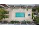 Aerial view of the community's refreshing pool and hot tub surrounded by lounge chairs at 301 2Nd N St # 14, St Petersburg, FL 33701