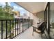 Private balcony overlooks a courtyard, pool, and jacuzzi at 301 2Nd N St # 14, St Petersburg, FL 33701