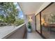 Balcony view with a sliding glass door and decorative potted plant at 301 2Nd N St # 14, St Petersburg, FL 33701