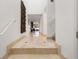 Elegant hallway with marble floors and staircase, leading to bright open living spaces at 301 2Nd N St # 14, St Petersburg, FL 33701
