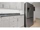 This modern kitchen boasts sleek stainless steel appliances and ample white cabinet storage at 301 2Nd N St # 14, St Petersburg, FL 33701