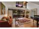 A stylish living area with piano, sofa, large windows, and a view to the terrace at 301 2Nd N St # 14, St Petersburg, FL 33701