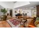 Open concept living room with beautiful hardwood floors and elegant decor at 301 2Nd N St # 14, St Petersburg, FL 33701