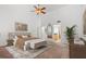 Well-lit main bedroom boasts neutral decor, large windows, and an en-suite bathroom at 301 2Nd N St # 14, St Petersburg, FL 33701
