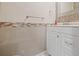 Bathroom featuring modern tile accents, a white vanity, and sleek fixtures at 3368 Ramblewood Pl # 37-D-1, Sarasota, FL 34237
