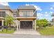 Townhome exterior with carport, balcony, and neat landscaping at 3368 Ramblewood Pl # 37-D-1, Sarasota, FL 34237