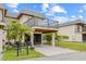 Charming condo featuring an attached carport, balcony, and a well-maintained lawn at 3368 Ramblewood Pl # 37-D-1, Sarasota, FL 34237