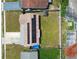 Overhead view of the home highlighting the solar panels and spacious backyard at 3427 Cantrell St, Holiday, FL 34690