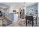 Modern kitchen with stainless steel appliances, white cabinets, and an open layout at 387 S Mcmullen Booth Rd # 16, Clearwater, FL 33759