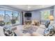 Cozy living area with a balcony, desk area and plenty of natural light at 387 S Mcmullen Booth Rd # 16, Clearwater, FL 33759