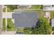 Overhead view of house, showing the roof, landscaping, patio and layout of the home and surrounding property at 4604 W Euclid Ave, Tampa, FL 33629