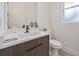 Charming bathroom features a modern vanity, sleek fixtures, and ample natural light at 4604 W Euclid Ave, Tampa, FL 33629