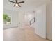 Bright bedroom featuring neutral paint, modern ceiling fan, and spacious closet at 4604 W Euclid Ave, Tampa, FL 33629